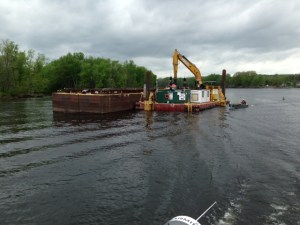 A dredge on the Hudson River removing sediment laced with PCB's