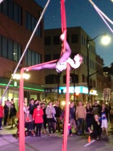 The acrobat at the street celebration Saturday evening