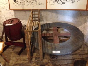An interesting exhibit in the Blockhouse Museum - everyone had to pull his own weight in the old days, including Fido - this is a dog-powered butter churn.  The dog was put in the cage on the left side of the wheel.  As the dog walked forward (enticed by some food, perhaps?), the dog turned the wheel upon which it was standing, which in turn operated the churn on the left, connected by a pulley to the wheel. Where was the SPCA?