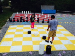One of the shops features a people-size checkers game and chess game