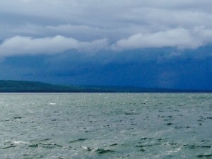 A storm built in the late afternoon - the wind kicked up, and whitecaps started rolling in.  We doubled all the dock lines, took down the aft bimini, and secured everything on deck.  Of course, all that preparation caused the storm to bypass us, and soon the wind diminished