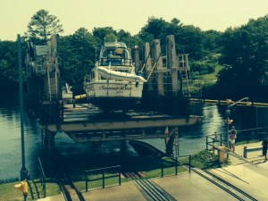 The larger boat descending into the river above
