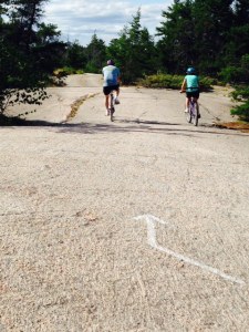 We ventured down a dirt road and came upon widespread outcroppings of smoothly scoured rock. The road in this picture is actually bedrock, with the painted arrow pointing the direction in which the road turns