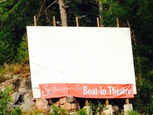 You've heard of a drive-in - Killarney has a boat-in.  The movie is projected on the screen which faces the docks and you tune into a particular channel on the FM radio and watch the movie from your boat