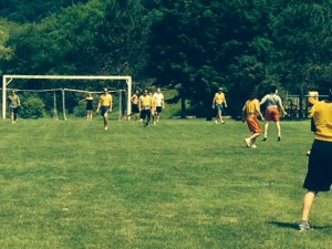 We started the tradition of a "kids vs. adults" soccer game when the kids were little and we could be assured of beating them.  That didn't last long. Now we arbitrarily divide into two teams and the older folks mostly just get in the way - but we're still out there playing!