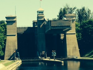 This is the view approaching the lock in the boat.  There are two chambers - the one on the right is in the air, at the level of the canal above, 6 1/2 stories higher than the level we are on.  We enter the chamber on the left after a gate at the entrance to the chamber submerges so we can pass over it