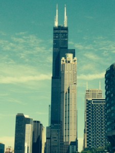 Chicago offers an "Architecture Tour" - a narrated boat tour that highlights and describes the architecture and history of many of the significant buildings in Chicago - this is the Sear Tower (now the Willis Tower) with another building in front of it