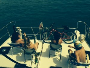 Danny, Leah, Joey, and Lauren enjoying the sights of the harbor on the "front porch" of the Joint Adventure