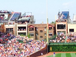 Two unique features of Wrigley Field are the ivy-covered outfield wall and the bleachers erected on top of houses across from the park.  My understanding is that the Cubs threatened to sue to adjacent building owners or build wall to block the view unless the building owners shared the revenue with the Cubs. I'm told a revenue-sharing settlement was reached, but now the Cubs are talking about erecting a huge scoreboard that will indeed block the views from some buildings. Why can't they focus on winning a World Series?