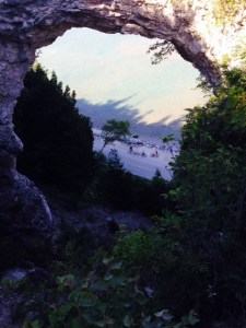 A natural arch along the coastline adjacent to the bike path. The island is underlain by a layer of rock salt, and consists mostly of limestone formed when the area was covered by a shallow lake. When the lake receded, the softer limestone started to dissolve and erode. About 4,000 years ago, the softer limestone under this arch fell away, forming the arch. It can be viewed from the bike path below, then accessed from an observation point above 