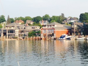 Homes right down to the waters edge line a portion of Charlevoix Harbor