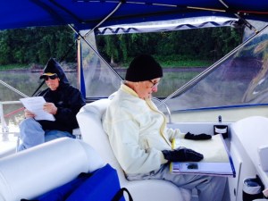 My Dad, concentrating on his chores as Navigator, with Tom in the background. This was taken early in the morning, so as you can see by the hat and gloves, it was chilly - actually, a welcome relief after a stretch of very hot weather most of the time since we reached Chicago