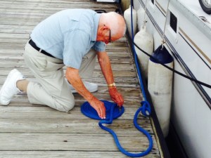 My Dad making sure our lines on the dock are ship shape - if only we kept the inside of the boat so neat and organized...