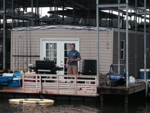 This is Dave and his homemade houseboat. Dave is the guy who drove us to Tupelo to visit Elvis's birthplace & museum.  Dave and his wife are from Wisconsin - he built the boat, then decided to take it down the inland rivers to Mobile. He had never piloted a boat like that before and had never been in a lock. Down the Mississippi, up the Ohio, down the Tennessee, then down the Tenn-Tom they went. They stopped overnight in Fulton, Mississippi a year and a half ago and never left. They live on the boat, she works at the local Community College, and he drives a long-haul tractor trailer