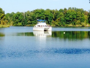 The Joint Adventure at anchor in the cove - the Tenn-Tom Waterway passes by in the background