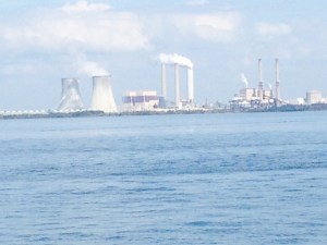 The Crystal River power plant located on the Gulf at the mouth of Crystal River. The nuclear reactor was permanently shut down in 2013 after a gap in the concrete containment building was discovered during a routine maintenance and upgrade. The gap was apparently caused earlier when workers cut the concrete containment to  replace a generator. The four coal-fired plants on the site continue to operate.