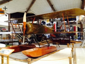 This is an early seaplane developed by the Navy - the large pontoons were made of plywood and had to be drained of water after every flight