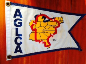 The white Looper flag identifies the vessel as underway on the Great Loop