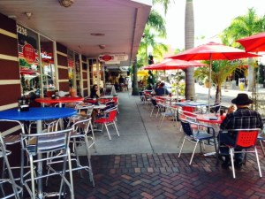 Sidewalk seating along the downtown streets activate the streets, which are alive with pedestrians
