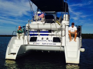 Paul and Hank watching us as we head off into the wilderness in the dinghy