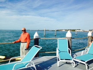 My Dad enjoying the view from the deck at the Tiki Bar at the marina -