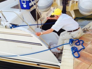Most marinas have finger piers that make it easy to get on and off the boat.  Not so at our dockage at Islamorada, with a fixed dock.  Because the dinghy hangs on davits and extends past the back of the boat, it becomes difficult to get on and off in this dockage configuration. Not a problem for my Dad, however!