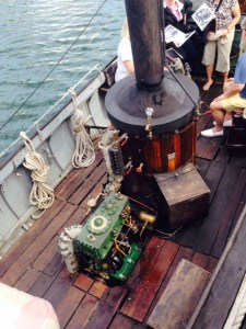 The African Queen is still steam powered - the steam boiler is in the center of the boat, and the steam engine is behind it, the workings fully exposed.