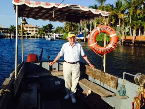 Hank sort of looks like Humphrey Bogart steering the African Queen....