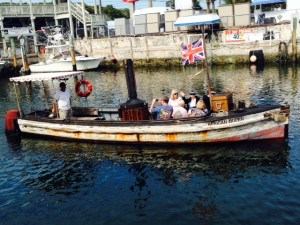 Hardcore movie buffs may recognize this boat. Hint:  if you look closely, you might see Humphrey Bogart or Lauren Bacall.  Yes, it is the African Queen. It was built in England and was shipped to the Congo for use as a supply transportation boat on the Congo River, The film producers purchased the boat for use in the movie.  Afterwards, it ended up in the US and fell into disrepair until it was purchased in 1982 and refurbished. When the owner's health failed, it again languished and deteriorated until a local Key West couple leased it and spent $90,000 repairing it. It now goes out several times a day for 1 1/2 hour tours.  My Dad being a movie buff, we of course had to go!
