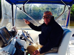 Tom Thurston piloting the Joint Adventure up the ICW