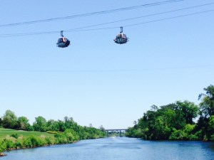 This tram carries golfers over the Intracoastal Waterway from one side of a golf course to the other - look closely and you can see the golf bags hooked to the side of each gondola.