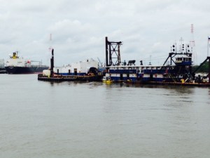 As we approached the city, we encountered a major dredging operation across most of the channel. The river is being dredged to a depth of 45 feet to conform to the deepening of the Panama Canal which is also underway so that Savannah can accommodate supertankers and other behemouths that will soon be able to go through the Canal. Failing to do so, officials fear, will cost Savannah dearly as the larger ships bypass Savannah and go elsewhere.