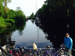 Approaching the lock at the start of the Dismal Swamp Canal. The Dismal Swamp is higher than the Pasquotank River at the southern end and Chesapeake Bay at the northern end. Hence, a lock at each end raises and lowers boats about 8 feet to enter or leave the Canal.
