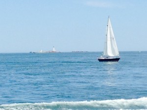 A welcome sight!  In the background is Boston Light, the second oldest operating lighthouse in North America. Many years ago, when my kids and their cousins were little, we were out exploring the harbor in a motorboat. I stopped to point out the beauty of Boston Light, explaining that many artists come to paint the scene, claiming that it was likely the most painted lighthouse in the world. After a brief moment, one of the kids asked:  "How many coats of paint do you think it's gotten?"