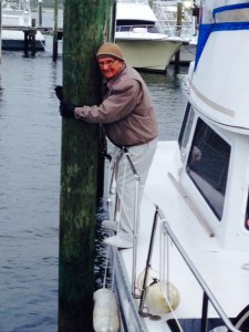 Hoffman's Marina in Manasquan is a short distance from the inlet, so there is a powerful current that makes docking maneuvers quite tricky, particularly when there is also a strong crosswind. My Dad is holding the boat in place while we untie the myriad of lines.