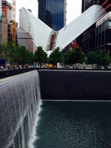  A small portion of the 9/11 Memorial. The white structure in the background is a sculpture still under construction, being built from remnants of the old World Trade Center towers.